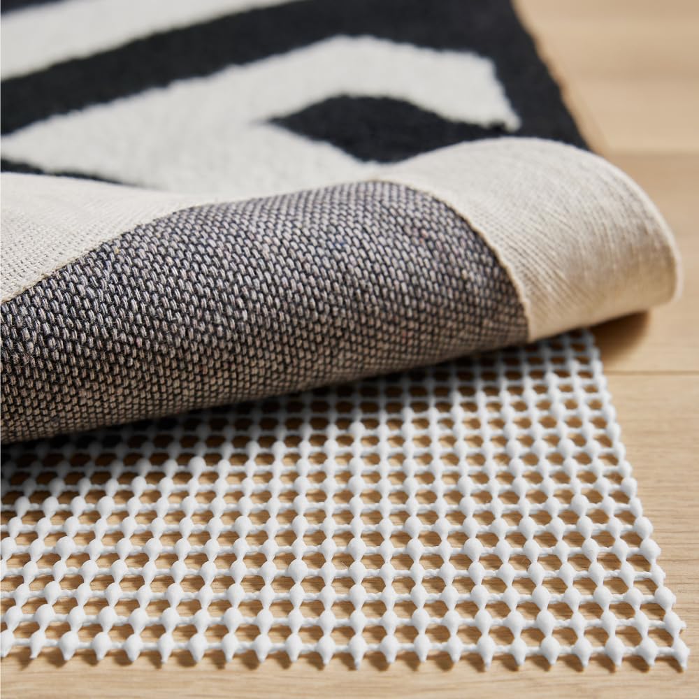 GORILLA GRIP® Strong Rug Pad Gripper, 8x10 FT, US Designed, Grips Help Keep Area Rugs Safe and in Place, Slip and Skid Resistant Pads for Hard Floors, Under Carpet Mat Cushion and Hardwood Protection