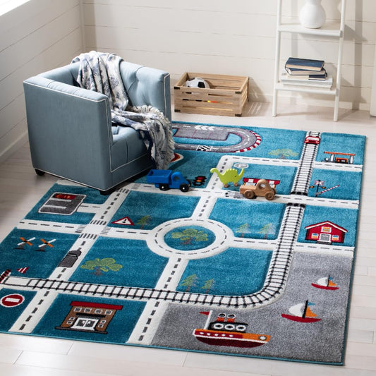 SAFAVIEH Carousel Kids Collection Area Rug - 5'3" x 7'6", Turquoise & Ivory, Non-Shedding & Easy Care, Ideal for High Traffic Areas for Boys & Girls in Playroom, Nursery, Bedroom (CRK192K)