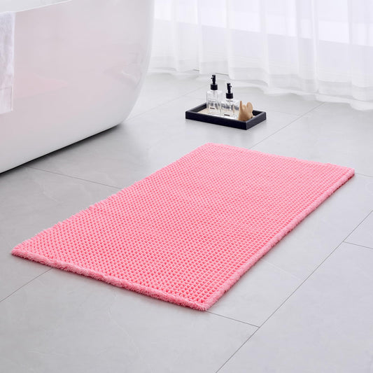 Ruggnovea Waffle Bath Mat Non Slip Washable 32x20, Super Absorbent Quick Dry Boho Bathroom Rugs with Tassels, High Density Non Slip Backing, Luxury Carpet for Tub&Shower, Pink