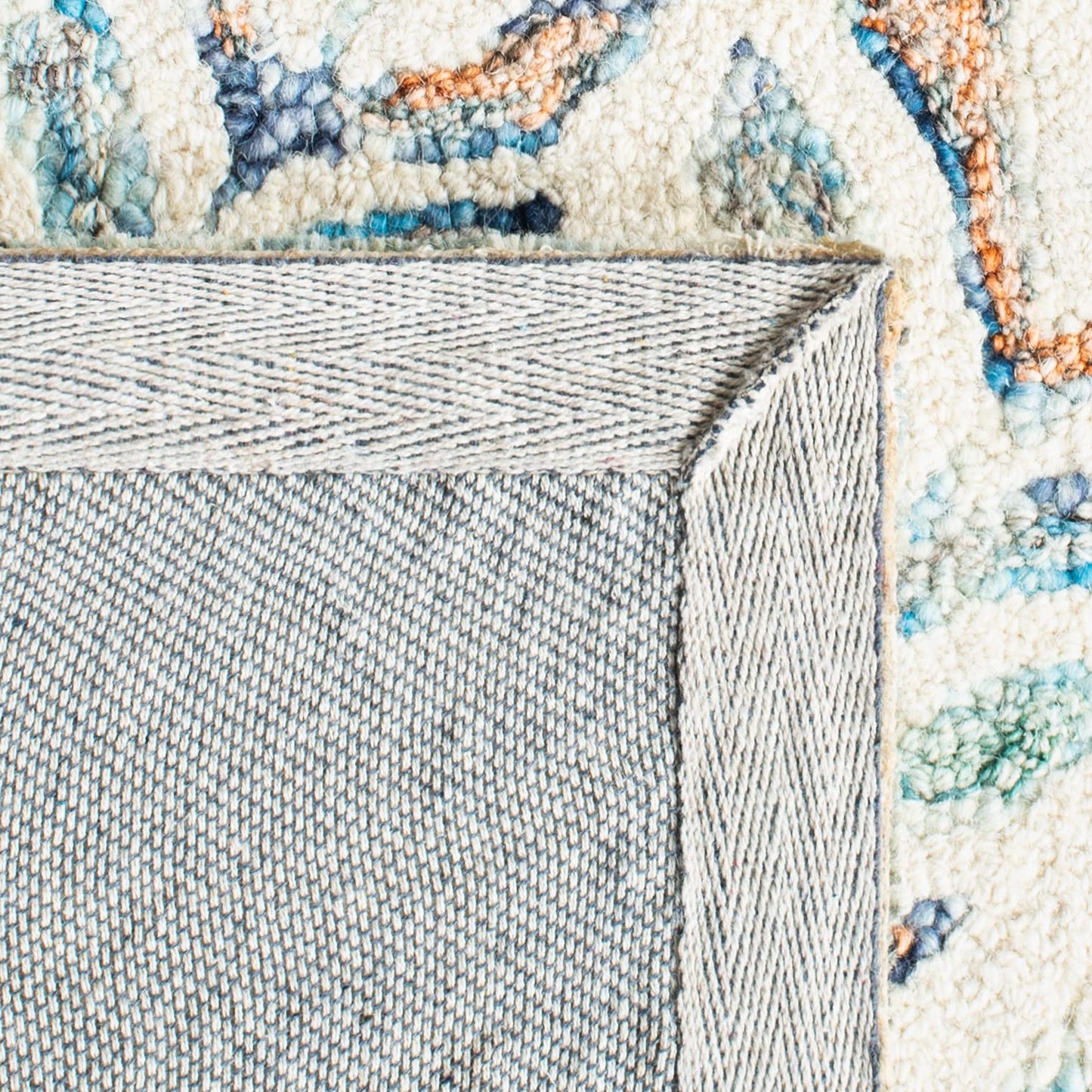 SAFAVIEH Capri Collection Accent Rug - 2'3" x 5', Ivory & Blue, Handmade Wool, Ideal for High Traffic Areas in Entryway, Living Room, Bedroom (CPR208A)