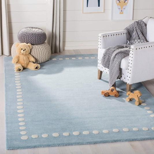 SAFAVIEH Kids Collection Accent Rug - 3' x 5', Blue & Ivory, Handmade Polka Dot Border Wool, Ideal for High Traffic Areas in Entryway, Living Room, Bedroom (SFK802M)