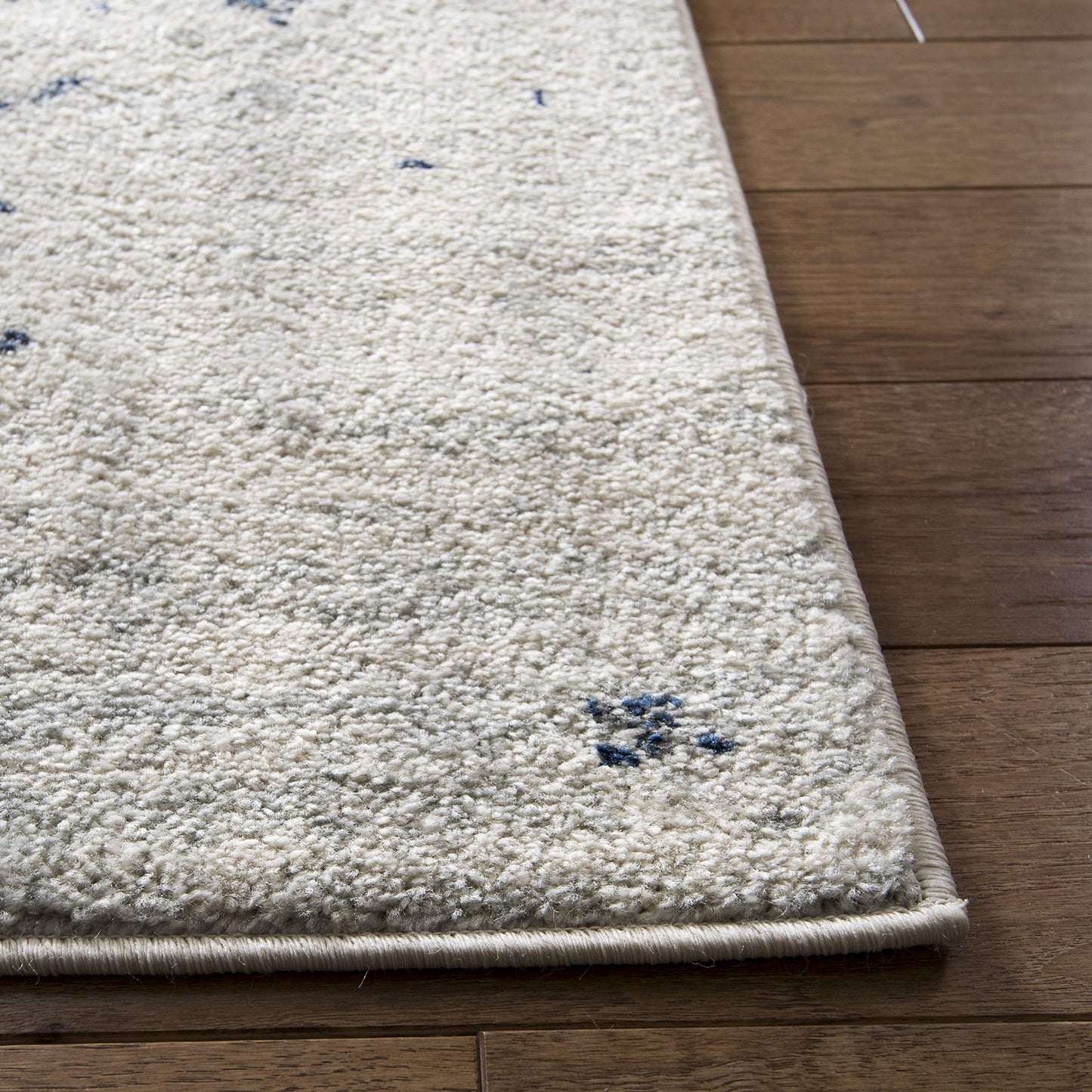SAFAVIEH Madison Collection Area Rug - 10' Square, Cream & Navy, Snowflake Medallion Distressed Design, Non-Shedding & Easy Care, Ideal for High Traffic Areas in Living Room, Bedroom (MAD603D)