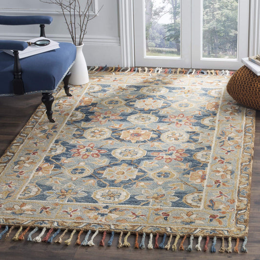 SAFAVIEH Aspen Collection Area Rug - 9' x 12', Grey & Navy, Handmade Boho Braided Tassel Wool, Ideal for High Traffic Areas in Living Room, Bedroom (APN110A)