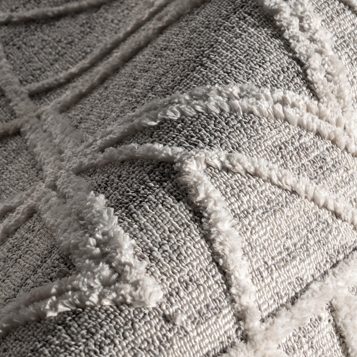 nuLOOM Oval 6'7" x 9' Ansley Moroccan Tassel Area Rug, Light Grey, High-Low Textured Bohemian Design, Plush High Pile, Stain Resistant, For Bedroom, Living Room, Hallway, Entryway
