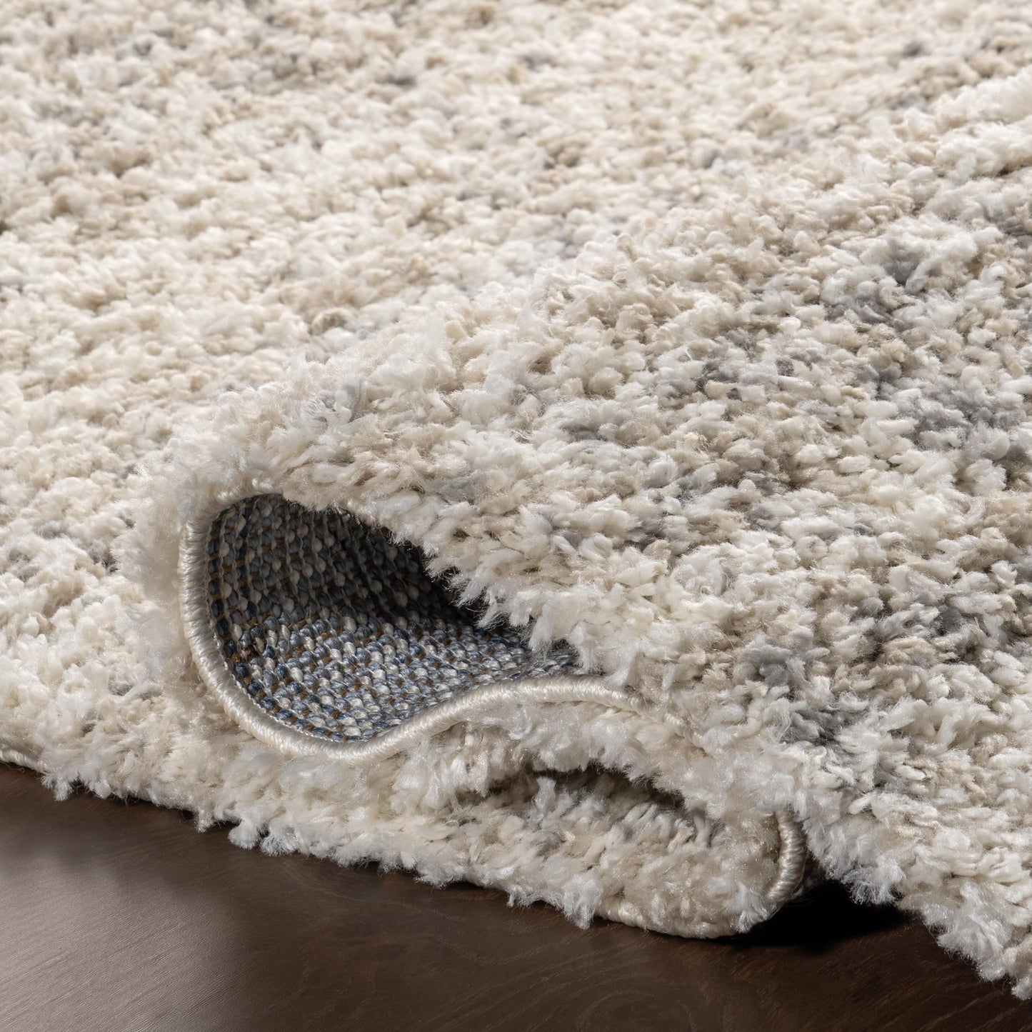 nuLOOM Brooke Shag Tasseled Area Rug - 7x9 Shag Area Rug Casual Ivory Rugs for Living Room Bedroom Dining Room Nursery