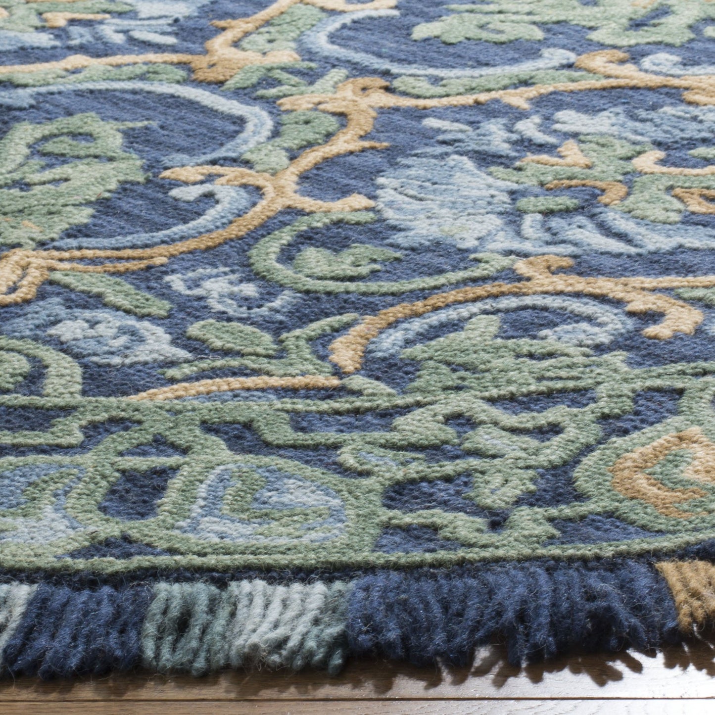 SAFAVIEH Blossom Collection Area Rug - 4' Round, Navy & Green, Handmade Boho Fringe Wool, Ideal for High Traffic Areas in Living Room, Bedroom (BLM422A)