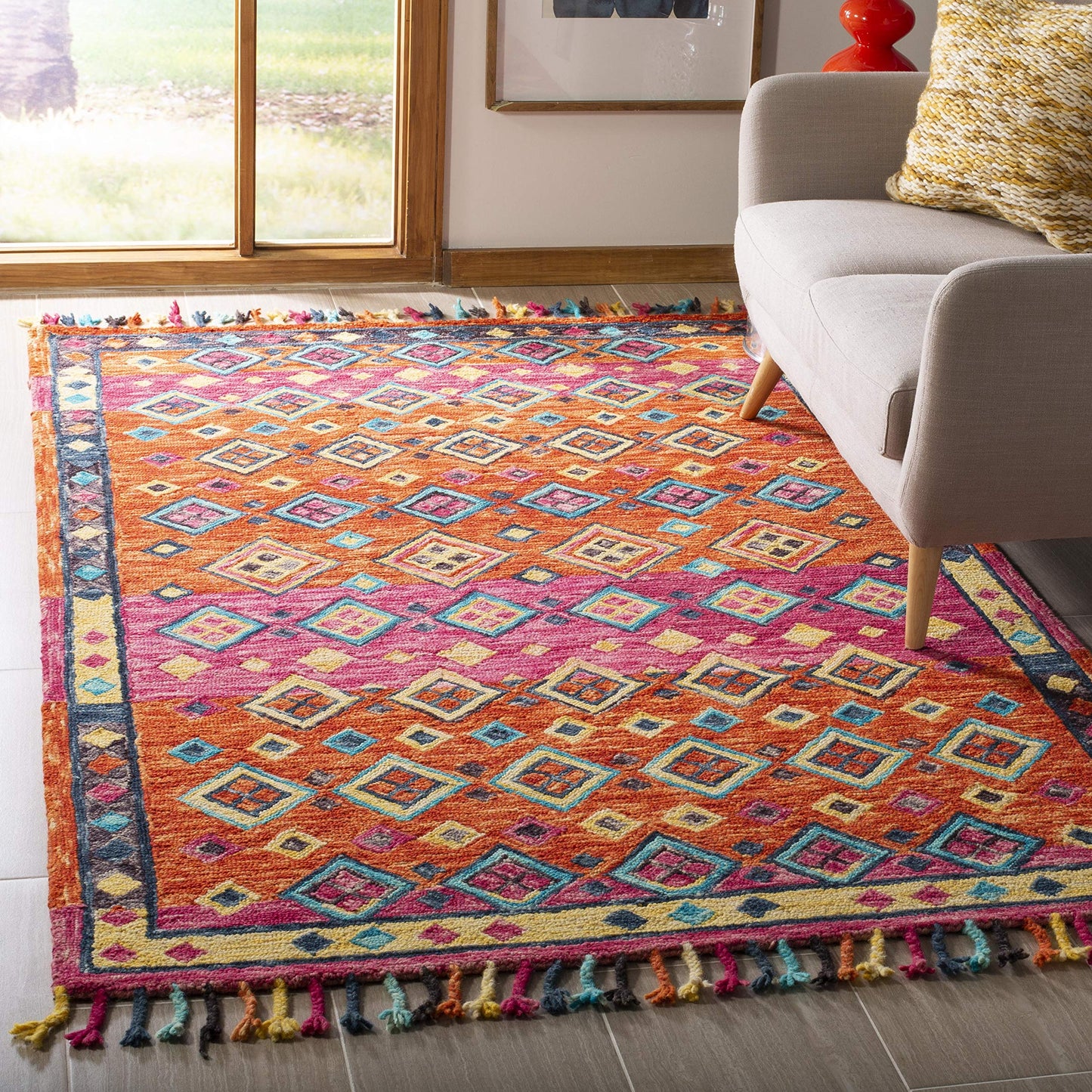 SAFAVIEH Aspen Collection Accent Rug - 3' x 5', Orange & Fuchsia, Handmade Boho Braided Tassel Wool, Ideal for High Traffic Areas in Entryway, Living Room, Bedroom (APN138A)