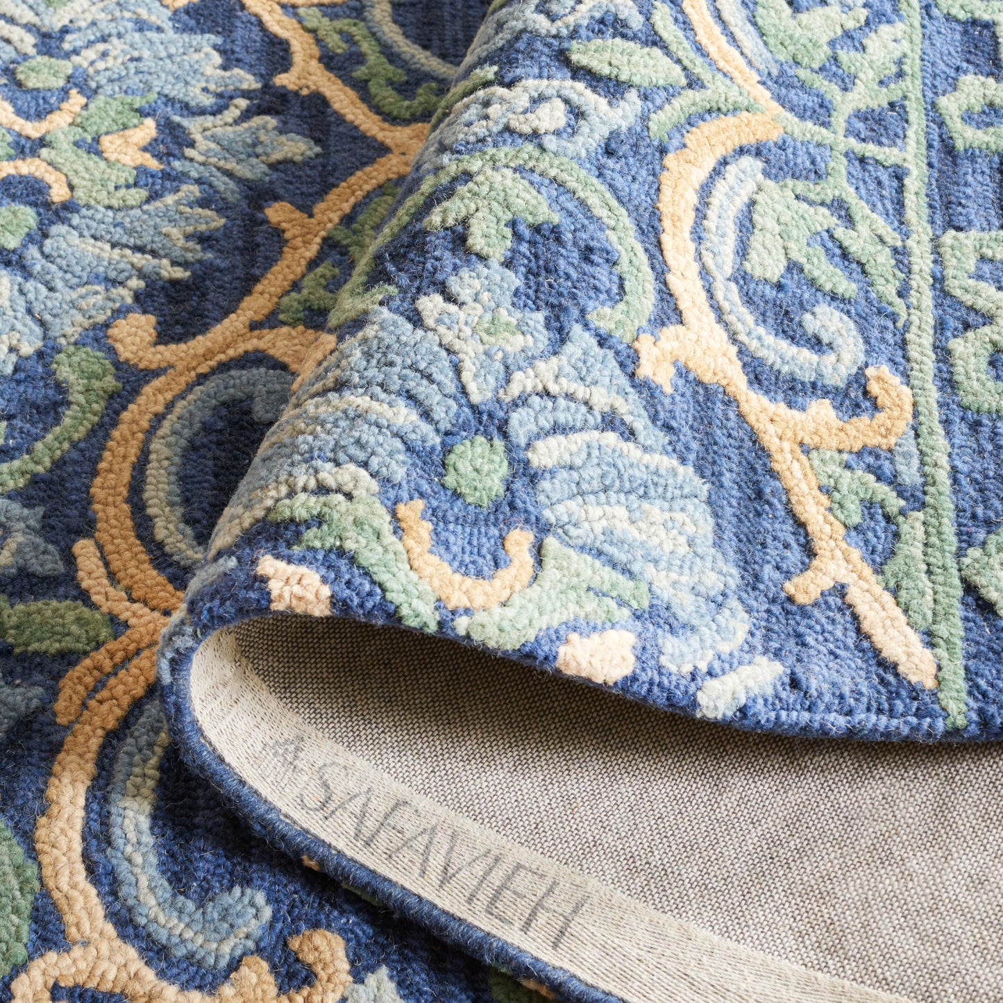 SAFAVIEH Blossom Collection Accent Rug - 2' x 3', Navy & Green, Handmade Boho Fringe Wool, Ideal for High Traffic Areas in Entryway, Living Room, Bedroom (BLM422A)