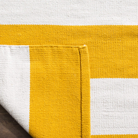 SAFAVIEH Montauk Collection Accent Rug - 2'3" x 5', Yellow & Ivory, Handmade Flatweave Cotton, Woven Texture, Farmhouse Stripe Pattern, Ideal for Entryway, Front Door, Bathroom (MTK712A)